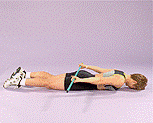 woman lying on face doing shoulder extension