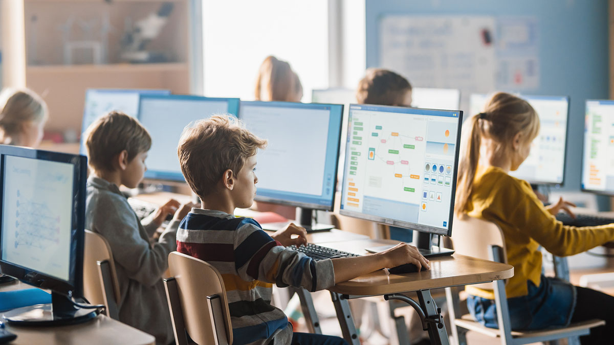 kids on computers in classroom